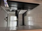 Keuken wit met zwart graniet werkblad 